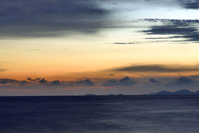 Scenic view of sea against sky at sunset