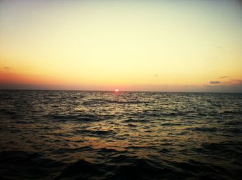 Scenic view of sea at sunset