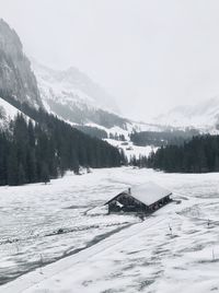 Scenic view of snowcapped mountain against sky