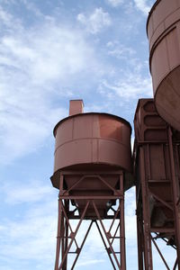 Low angle view of water tower against sky