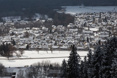 Cityscape against sky during winter