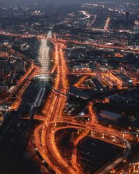 High angle view of illuminated cityscape at night