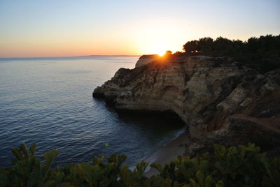 Scenic view of sea against sky during sunset