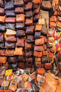 Full frame shot of multi colored store bags for sale in market