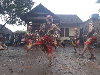 Group of people dancing during festival