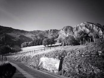 Country road leading towards mountains