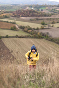 High angle view of yellow umbrella on land