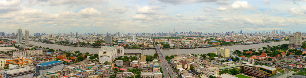 High angle view of buildings against sky in city