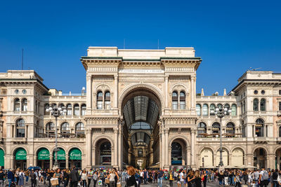 Group of people in front of building