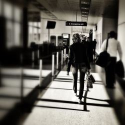 Woman walking on subway platform