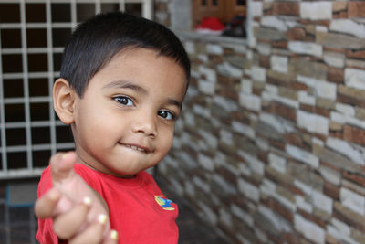 Portrait of cute boy smiling