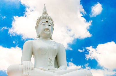 Low angle view of statue against sky