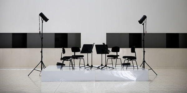 Empty chairs and tables in stadium