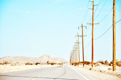 Road against sky during winter