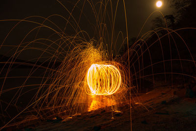 Firework display at night