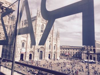 Tourists outside milan cathedral in italy