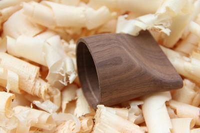 Close-up of wooden lid on shavings