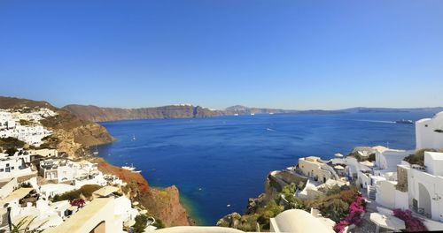 High angle view of sea against blue sky