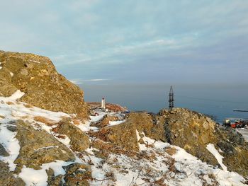 Scenic view of sea against sky during winter