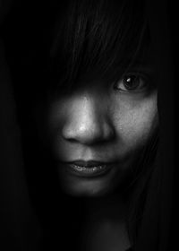 Close-up portrait of young woman