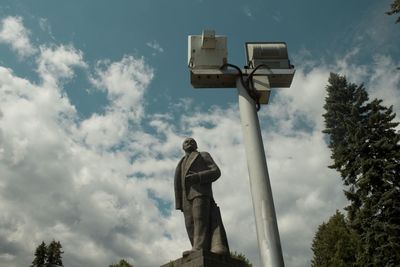 Low angle view of statue against sky