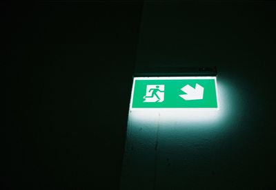 Low angle view of illuminated sign