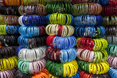 Full frame shot of multi colored bangles for sale