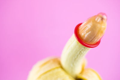 Close-up of apple against gray background