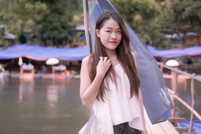 Portrait of teenage girl standing outdoors