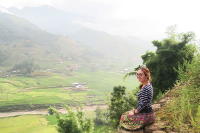 Full length of man on field against mountains