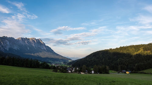 Landscape with mountain range in background