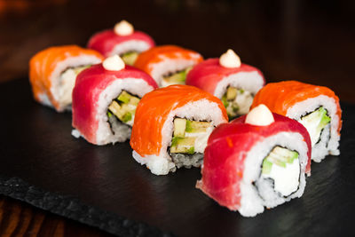 Close-up of sushi served on table