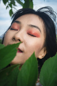 Close-up portrait of young woman