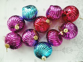 High angle view of colorful baubles on table