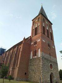 Low angle view of old building against sky