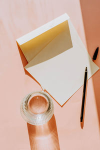 High angle view of paper on table