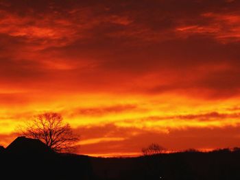 Scenic view of dramatic sky during sunset