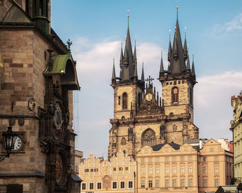 Low angle view of tyn church against sky