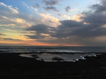 View of calm sea at sunset