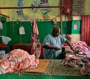 Man working at market stall