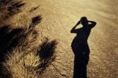 lifestyles, leisure activity, shadow, standing, sunlight, childhood, beach, focus on shadow, three quarter length, men, outdoors, sand, high angle view, silhouette, focus on foreground, casual clothing, day, boys