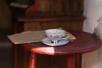 Close-up of coffee cup on table