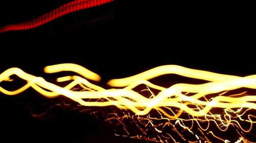 Close-up of illuminated light painting at night