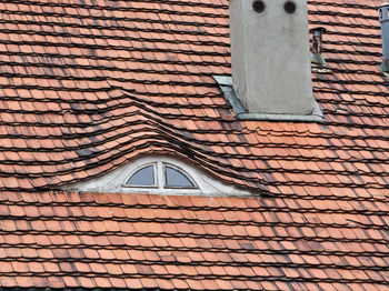 Low angle view of window on roof of building