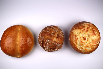 Close-up of bread against white background