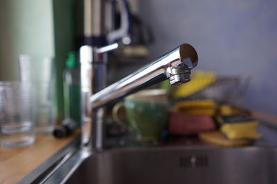 Close-up of faucet in kitchen