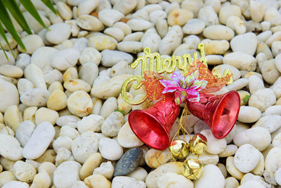 High angle view of pebbles on stones