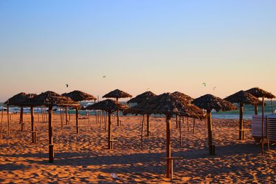 Scenic view of beach against clear sky