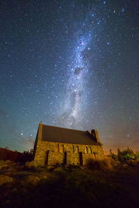 Old building against sky at night