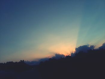 Scenic view of silhouette landscape against sky during sunset